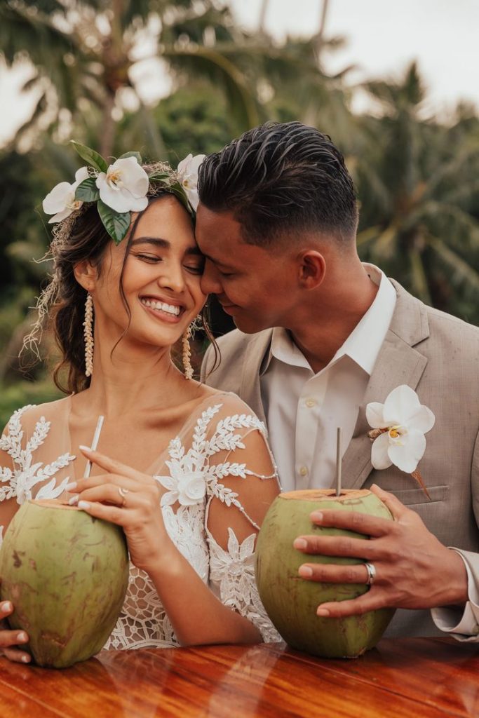 wedding photo with coconut in Hawaii