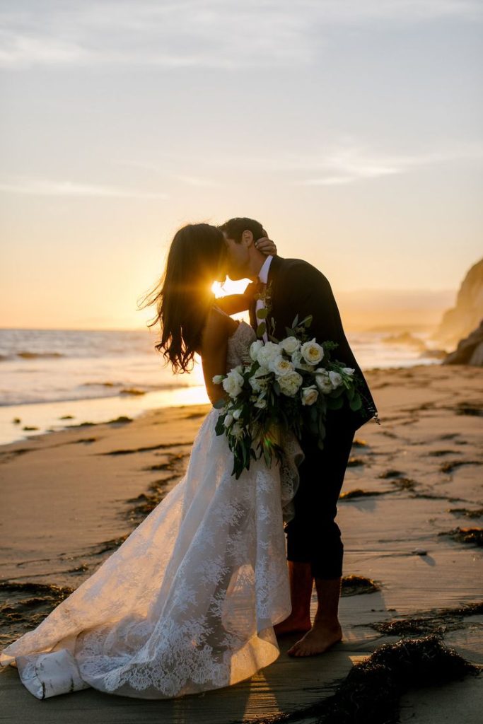 wedding photo in the sunset on the beach in california