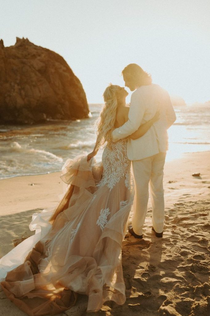 wedding photo in the sunset on the beach